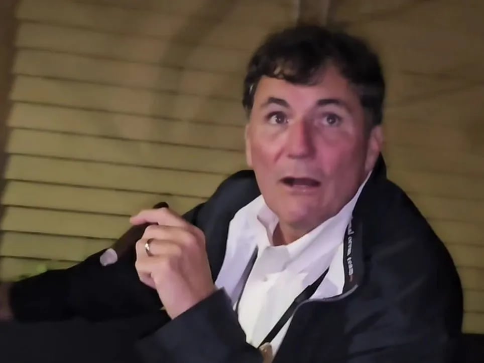 Dominic Leblanc smoking a cigar